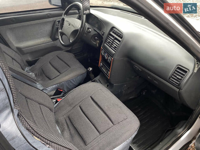 Серый ВАЗ 2111, объемом двигателя 1.6 л и пробегом 225 тыс. км за 2300 $, фото 8 на Automoto.ua