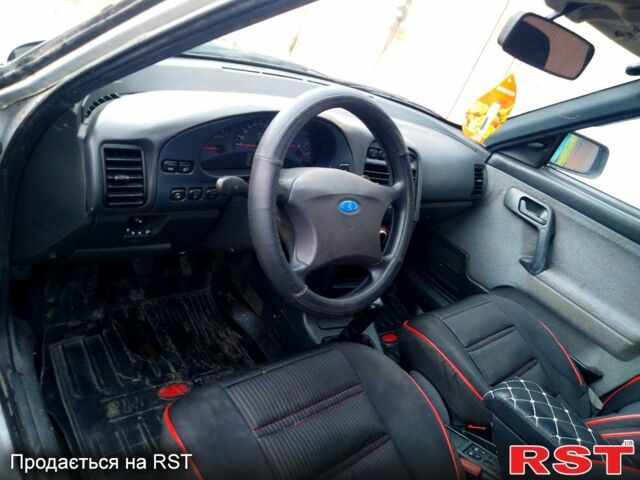 Серый ВАЗ 2111, объемом двигателя 1.6 л и пробегом 250 тыс. км за 1700 $, фото 5 на Automoto.ua