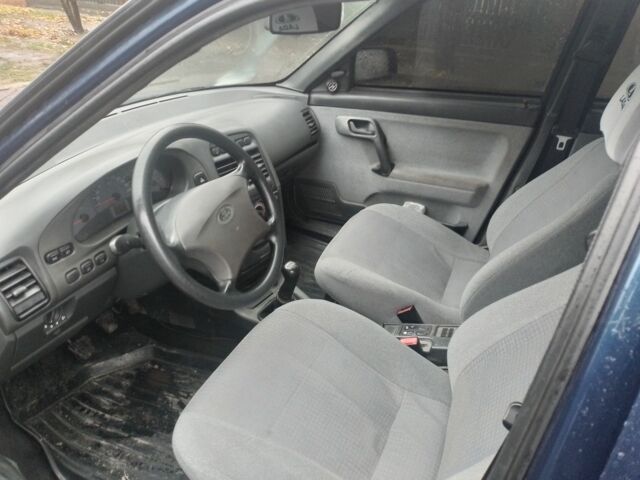 Синий ВАЗ 2111, объемом двигателя 1.6 л и пробегом 210 тыс. км за 1350 $, фото 4 на Automoto.ua