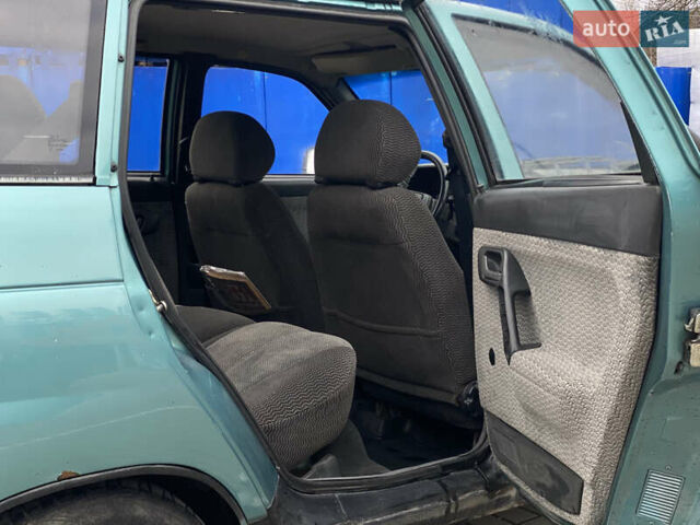 Зеленый ВАЗ 2111, объемом двигателя 1.5 л и пробегом 250 тыс. км за 1250 $, фото 10 на Automoto.ua