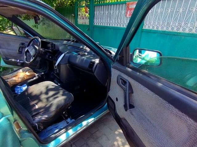 Зелений ВАЗ 2111, об'ємом двигуна 1.5 л та пробігом 245 тис. км за 1500 $, фото 4 на Automoto.ua