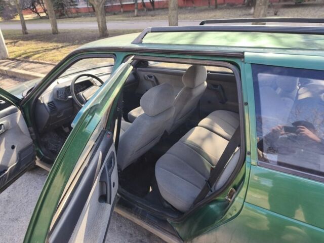 Зеленый ВАЗ 2111, объемом двигателя 1.5 л и пробегом 166 тыс. км за 1609 $, фото 7 на Automoto.ua