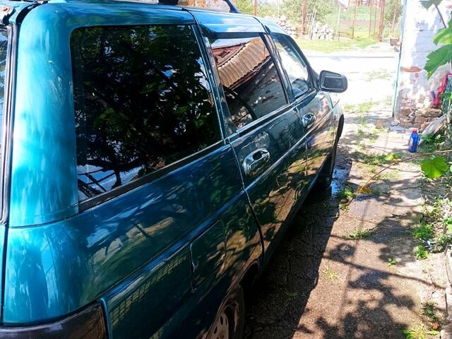 Зеленый ВАЗ 2111, объемом двигателя 1.5 л и пробегом 0 тыс. км за 1600 $, фото 2 на Automoto.ua