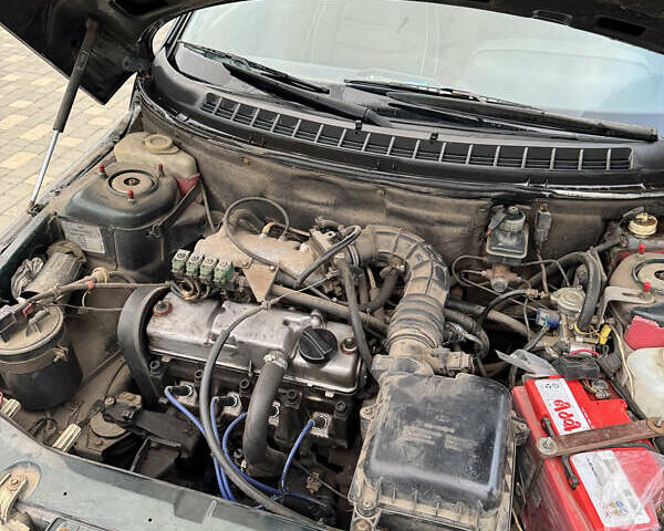 Зеленый ВАЗ 2111, объемом двигателя 1.5 л и пробегом 200 тыс. км за 1699 $, фото 14 на Automoto.ua