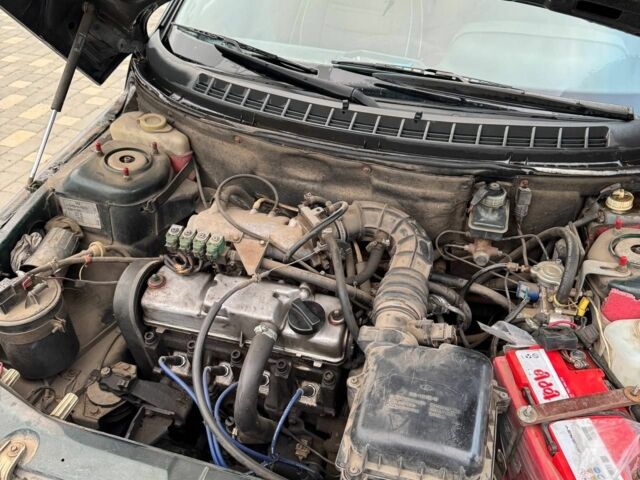 Зеленый ВАЗ 2111, объемом двигателя 1.5 л и пробегом 236 тыс. км за 1599 $, фото 15 на Automoto.ua