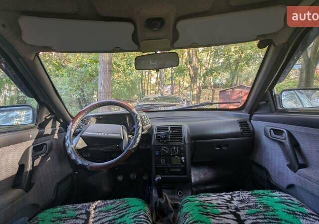 Зеленый ВАЗ 2111, объемом двигателя 1.5 л и пробегом 212 тыс. км за 1800 $, фото 4 на Automoto.ua