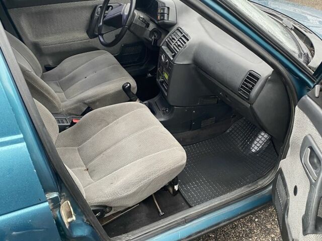 Зеленый ВАЗ 2111, объемом двигателя 1.5 л и пробегом 211 тыс. км за 1999 $, фото 6 на Automoto.ua