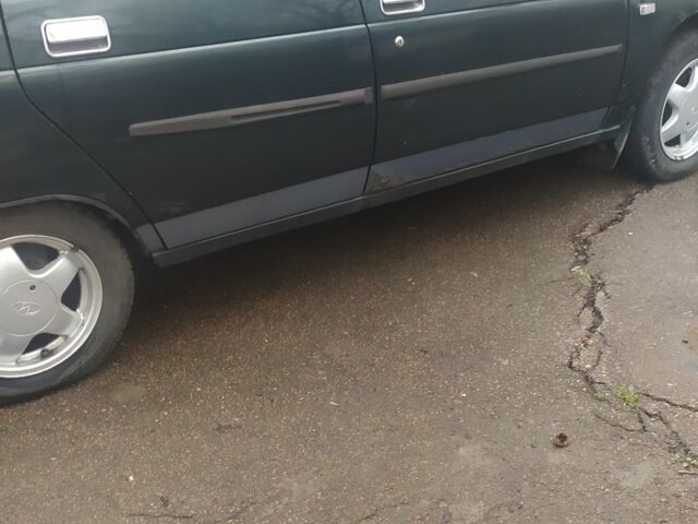 Зелений ВАЗ 2111, об'ємом двигуна 1 л та пробігом 279 тис. км за 1300 $, фото 3 на Automoto.ua