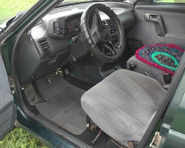 Зеленый ВАЗ 2111, объемом двигателя 1.5 л и пробегом 286 тыс. км за 1750 $, фото 7 на Automoto.ua