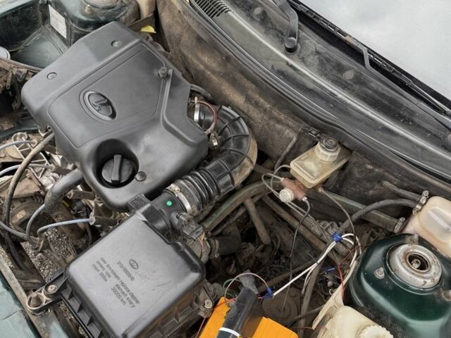 Зеленый ВАЗ 2111, объемом двигателя 1.5 л и пробегом 303 тыс. км за 1313 $, фото 7 на Automoto.ua