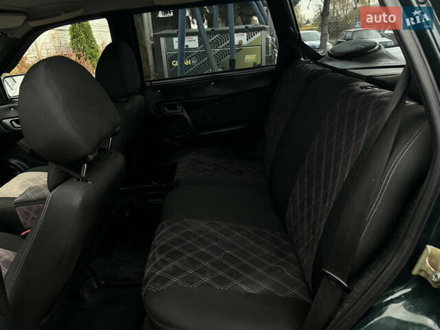 Зеленый ВАЗ 2111, объемом двигателя 1.5 л и пробегом 250 тыс. км за 1900 $, фото 5 на Automoto.ua