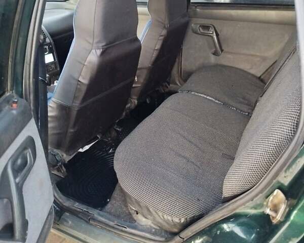 Зеленый ВАЗ 2111, объемом двигателя 1.5 л и пробегом 350 тыс. км за 1400 $, фото 4 на Automoto.ua