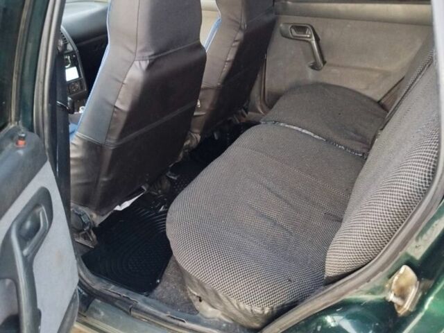 Зеленый ВАЗ 2111, объемом двигателя 1.5 л и пробегом 350 тыс. км за 1400 $, фото 5 на Automoto.ua