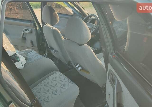 Зеленый ВАЗ 2111, объемом двигателя 1.6 л и пробегом 100 тыс. км за 3500 $, фото 32 на Automoto.ua