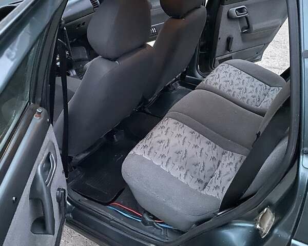 Зелений ВАЗ 2111, об'ємом двигуна 1.6 л та пробігом 186 тис. км за 2050 $, фото 4 на Automoto.ua