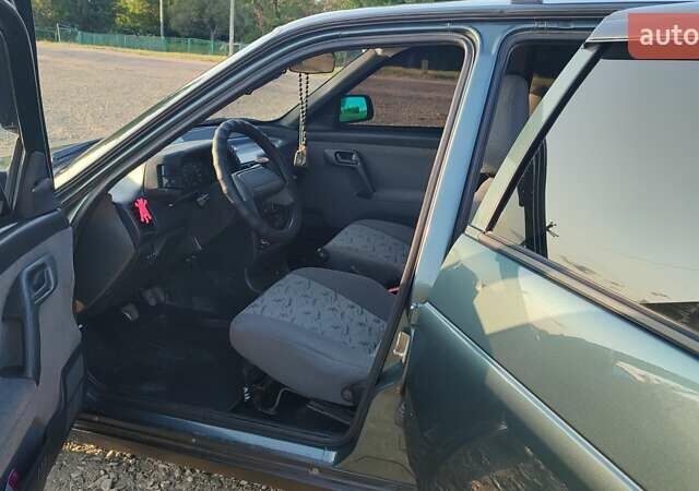 Зеленый ВАЗ 2111, объемом двигателя 1.6 л и пробегом 100 тыс. км за 3500 $, фото 36 на Automoto.ua