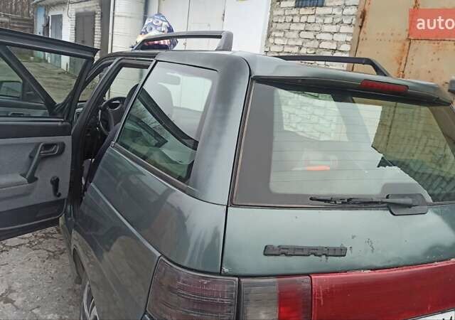 Зеленый ВАЗ 2111, объемом двигателя 1.6 л и пробегом 250 тыс. км за 2000 $, фото 1 на Automoto.ua