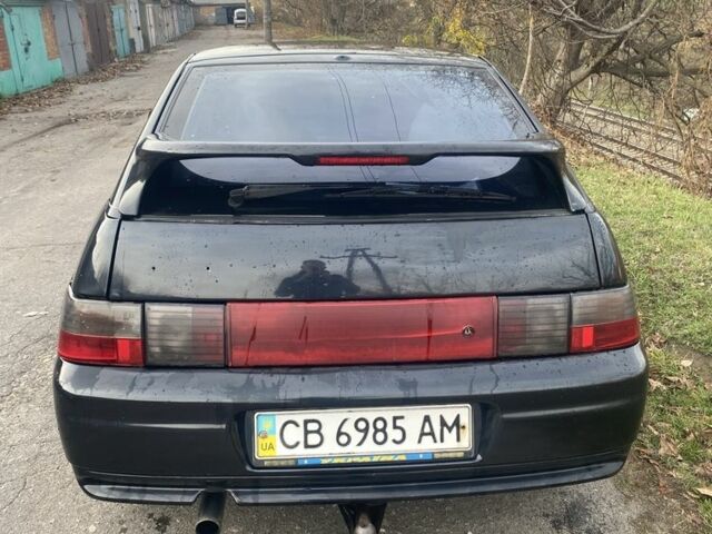 Черный ВАЗ 2112, объемом двигателя 1.6 л и пробегом 294 тыс. км за 1800 $, фото 3 на Automoto.ua