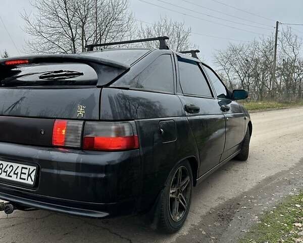 Черный ВАЗ 2112, объемом двигателя 1.6 л и пробегом 245 тыс. км за 1799 $, фото 1 на Automoto.ua