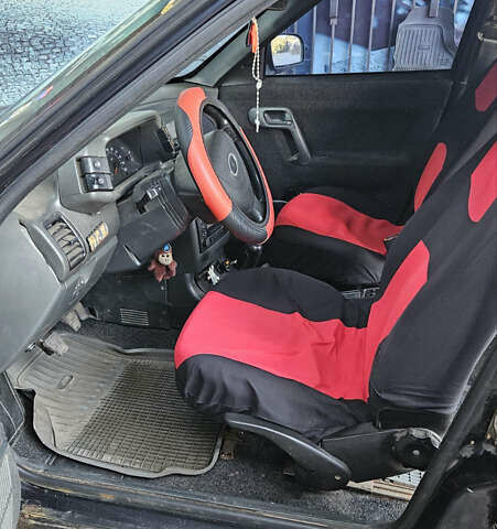 Черный ВАЗ 2112, объемом двигателя 1.6 л и пробегом 290 тыс. км за 2150 $, фото 8 на Automoto.ua
