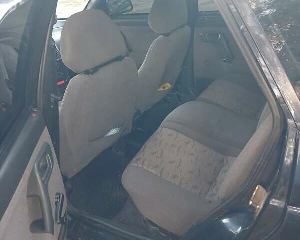 Черный ВАЗ 2112, объемом двигателя 1.6 л и пробегом 181 тыс. км за 1750 $, фото 5 на Automoto.ua