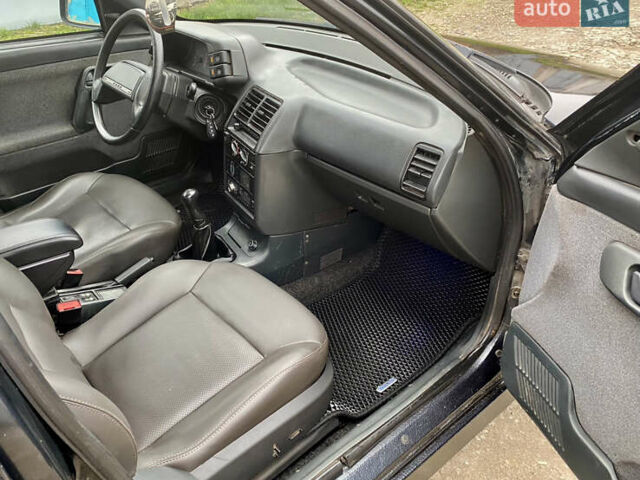 Чорний ВАЗ 2112, об'ємом двигуна 1.6 л та пробігом 250 тис. км за 1999 $, фото 7 на Automoto.ua