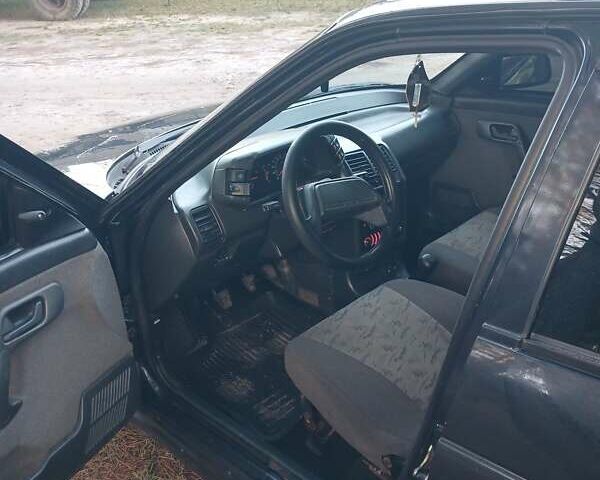 Черный ВАЗ 2112, объемом двигателя 1.6 л и пробегом 181 тыс. км за 1750 $, фото 4 на Automoto.ua