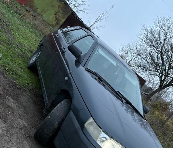 Черный ВАЗ 2112, объемом двигателя 1.6 л и пробегом 162 тыс. км за 1250 $, фото 1 на Automoto.ua