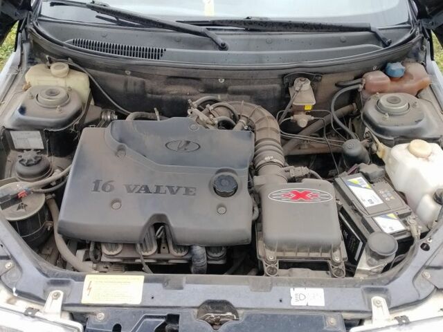 Чорний ВАЗ 2112, об'ємом двигуна 1.6 л та пробігом 127 тис. км за 2000 $, фото 4 на Automoto.ua