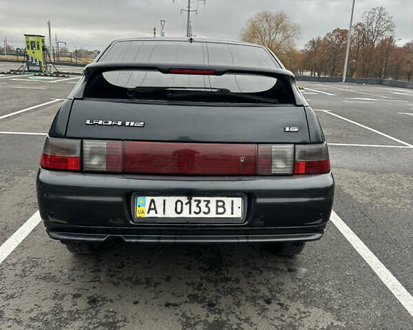 Черный ВАЗ 2112, объемом двигателя 1.6 л и пробегом 242 тыс. км за 1999 $, фото 5 на Automoto.ua