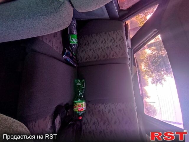 Черный ВАЗ 2112, объемом двигателя 1.6 л и пробегом 212 тыс. км за 2000 $, фото 4 на Automoto.ua