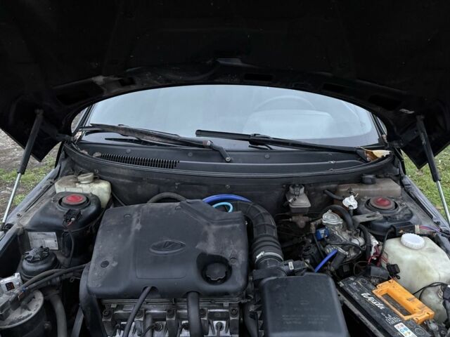 Черный ВАЗ 2112, объемом двигателя 1.6 л и пробегом 162 тыс. км за 1250 $, фото 4 на Automoto.ua