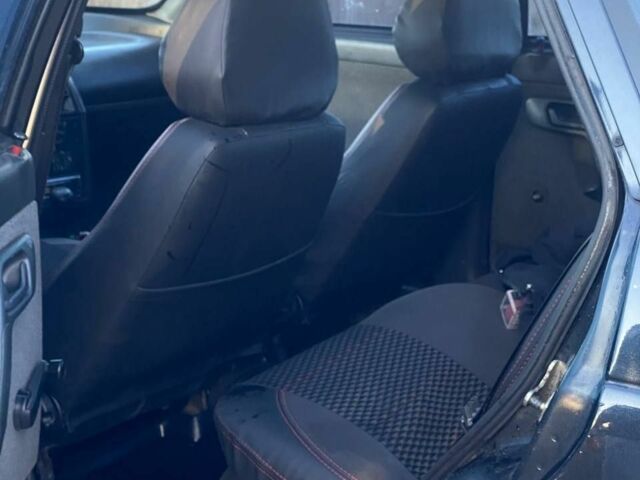 Черный ВАЗ 2112, объемом двигателя 1.6 л и пробегом 166 тыс. км за 2300 $, фото 7 на Automoto.ua