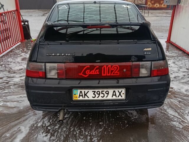 Чорний ВАЗ 2112, об'ємом двигуна 1 л та пробігом 1000 тис. км за 1050 $, фото 3 на Automoto.ua