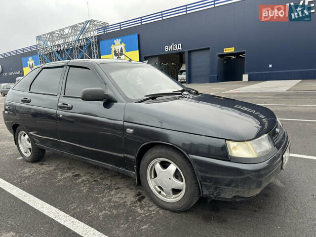 Черный ВАЗ 2112, объемом двигателя 1.6 л и пробегом 242 тыс. км за 1999 $, фото 1 на Automoto.ua