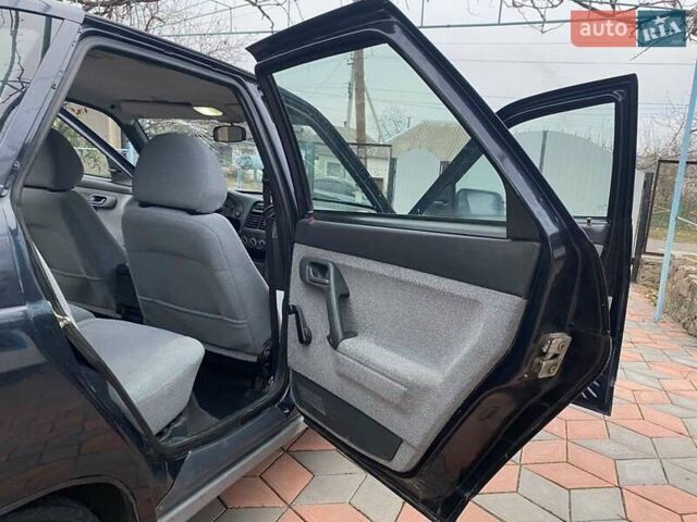 ВАЗ 2112 2008 в Первомайск на Automoto.ua Черный ВАЗ 2112, объемом двигателя 1.6 л и пробегом 96 тыс. км за 2700 $, фото 23 на Automoto.ua