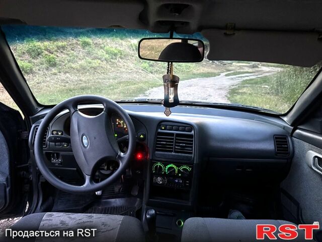 Черный ВАЗ 2112, объемом двигателя 1.6 л и пробегом 169 тыс. км за 1600 $, фото 7 на Automoto.ua