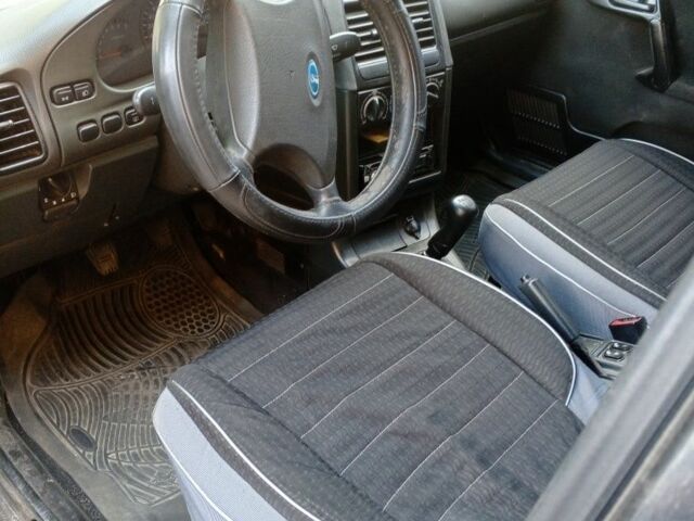 Черный ВАЗ 2112, объемом двигателя 1.6 л и пробегом 250 тыс. км за 2500 $, фото 3 на Automoto.ua