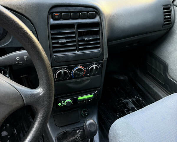 Черный ВАЗ 2112, объемом двигателя 1.6 л и пробегом 114 тыс. км за 1699 $, фото 13 на Automoto.ua