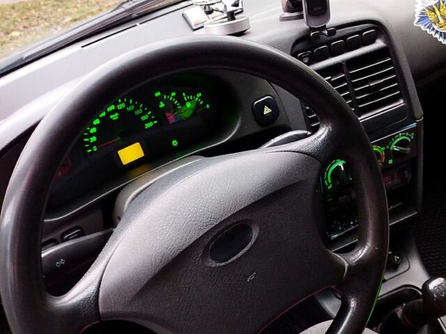 Черный ВАЗ 2112, объемом двигателя 1.6 л и пробегом 170 тыс. км за 2000 $, фото 4 на Automoto.ua