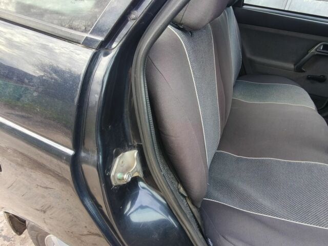 Черный ВАЗ 2112, объемом двигателя 1.6 л и пробегом 200 тыс. км за 1188 $, фото 13 на Automoto.ua