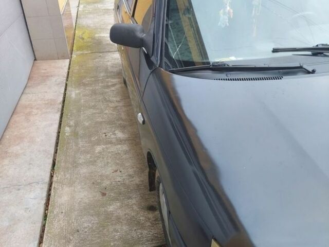 Черный ВАЗ 2112, объемом двигателя 1.6 л и пробегом 210 тыс. км за 1250 $, фото 1 на Automoto.ua