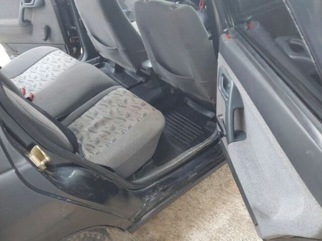 Черный ВАЗ 2112, объемом двигателя 1.6 л и пробегом 210 тыс. км за 1250 $, фото 4 на Automoto.ua