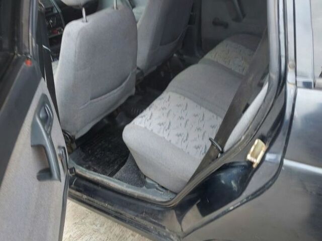 Черный ВАЗ 2112, объемом двигателя 1.6 л и пробегом 210 тыс. км за 1250 $, фото 5 на Automoto.ua