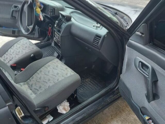 Черный ВАЗ 2112, объемом двигателя 1.6 л и пробегом 210 тыс. км за 1250 $, фото 7 на Automoto.ua