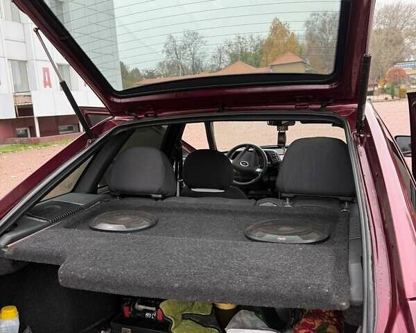 Красный ВАЗ 2112, объемом двигателя 1.6 л и пробегом 222 тыс. км за 2700 $, фото 11 на Automoto.ua