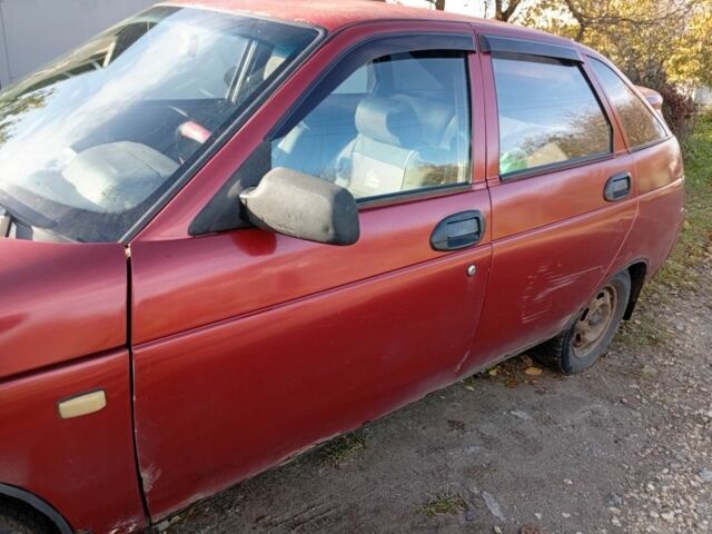 Красный ВАЗ 2112, объемом двигателя 1.5 л и пробегом 336 тыс. км за 1200 $, фото 4 на Automoto.ua