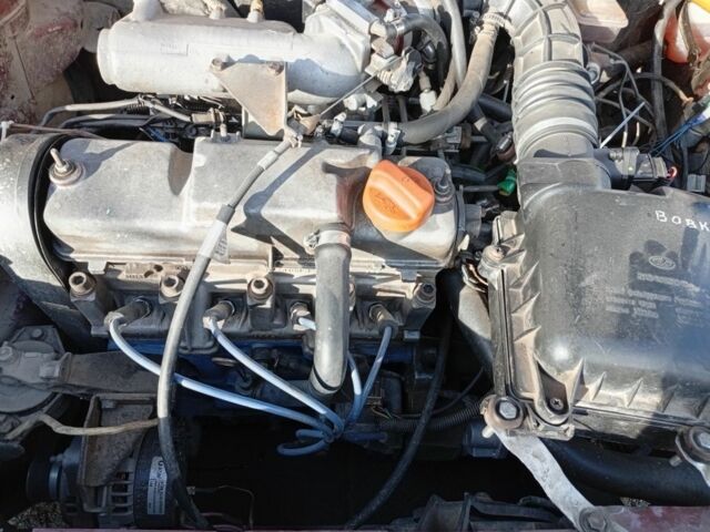 Красный ВАЗ 2112, объемом двигателя 1.5 л и пробегом 336 тыс. км за 1200 $, фото 1 на Automoto.ua