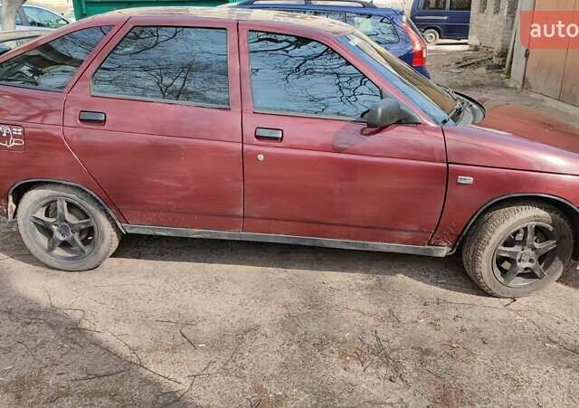 Красный ВАЗ 2112, объемом двигателя 1.5 л и пробегом 340 тыс. км за 2099 $, фото 4 на Automoto.ua