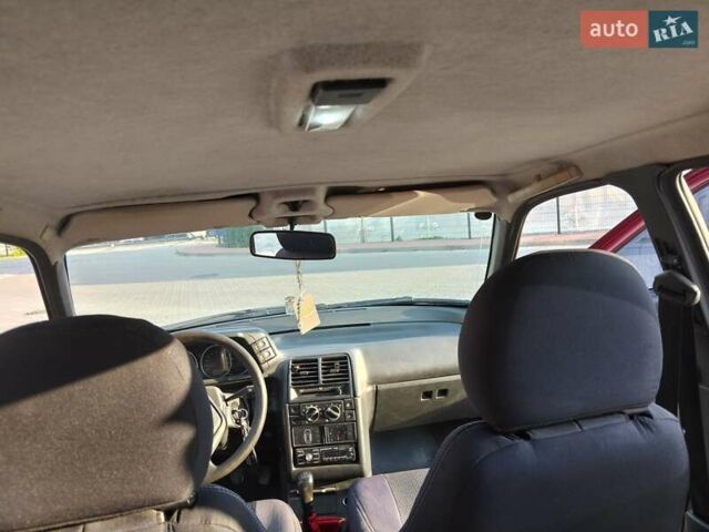 Красный ВАЗ 2112, объемом двигателя 1.6 л и пробегом 131 тыс. км за 2250 $, фото 11 на Automoto.ua